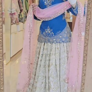 Royal Blue Embroidered Peplum Top with Mirror Work Lehenga and Net Dupatta