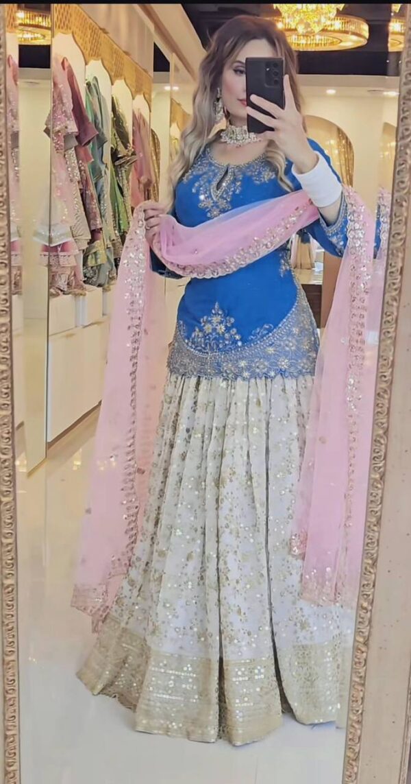 Royal Blue Embroidered Peplum Top with Mirror Work Lehenga and Net Dupatta